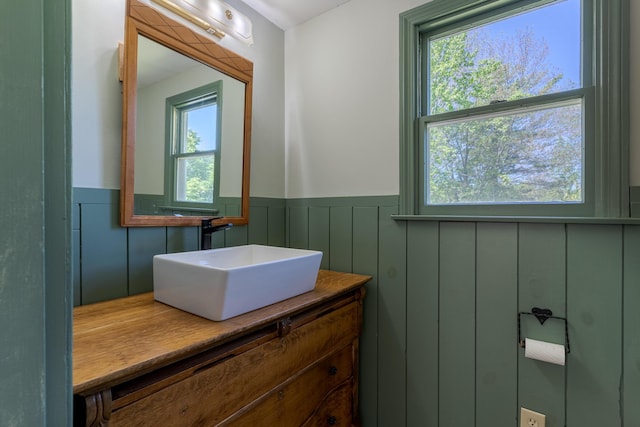 110 Elm St, North Berwick, ME 03906 - bathroom featuring wainscoting and vanity