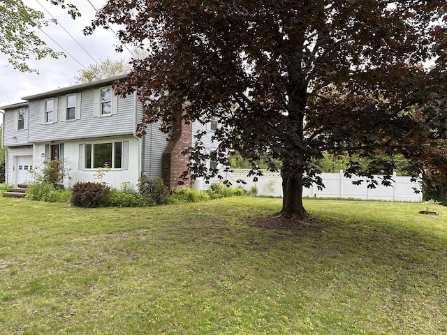 110 Elm St, North Berwick, ME 03906 - view of front facade featuring a garage and board and batten siding