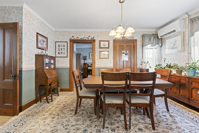 94 Union St, Bath, ME 04530 - dining area featuring wallpapered walls, a wall mounted AC, a chandelier, ornamental molding, and wainscoting