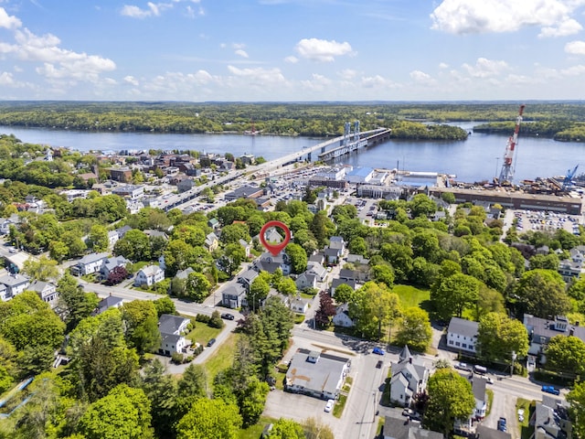 94 Union St, Bath, ME 04530 - aerial view of property's location with a nearby body of water, a notable bridge, and a tree filled landscape