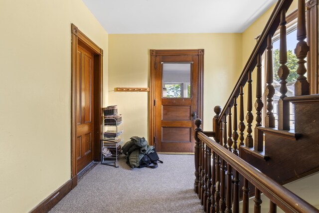 94 Union St, Bath, ME 04530 - hallway with carpet, baseboards, and stairs