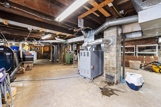 94 Union St, Bath, ME 04530 - unfinished below grade area with washer / clothes dryer and heating unit