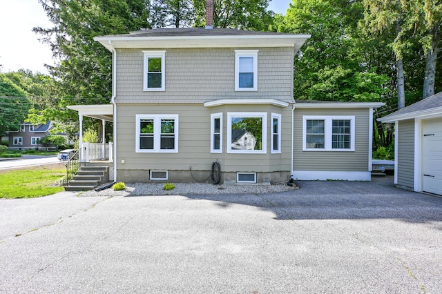24 Western Ave, Auburn, ME 04210 - view of front facade with a chimney