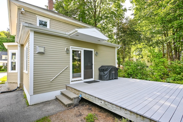 24 Western Ave, Auburn, ME 04210 - wooden deck with a grill