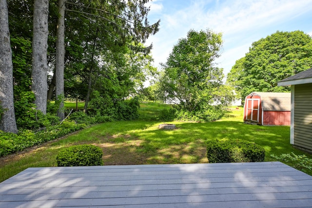 24 Western Ave, Auburn, ME 04210 - view of grassy yard with a deck