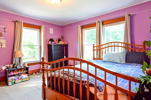 24 Western Ave, Auburn, ME 04210 - carpeted bedroom featuring multiple windows and ornamental molding