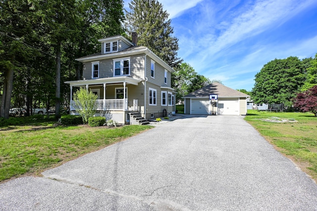 24 Western Ave, Auburn, ME 04210 - american foursquare style home with a porch, an outbuilding, a chimney, a garage, and a front lawn