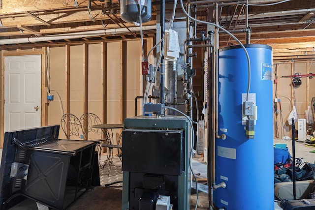 27 Russell Ln, Damariscotta, ME 04543 - utility room with water heater and a heating unit