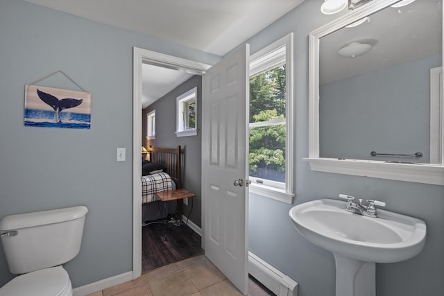 27 Russell Ln, Damariscotta, ME 04543 - bathroom featuring baseboard heating and tile patterned flooring