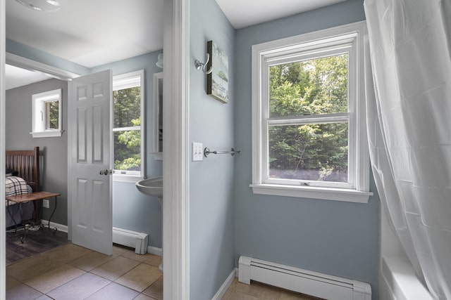 27 Russell Ln, Damariscotta, ME 04543 - doorway with baseboard heating and tile patterned flooring