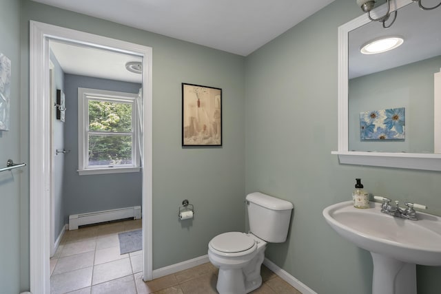 27 Russell Ln, Damariscotta, ME 04543 - bathroom with a baseboard radiator and tile patterned flooring