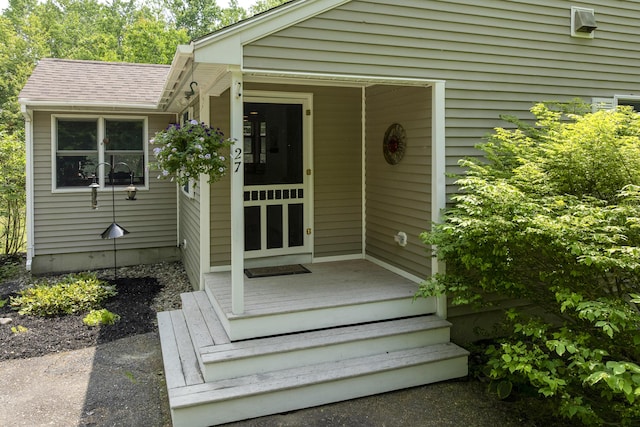27 Russell Ln, Damariscotta, ME 04543 - doorway to property featuring roof with shingles