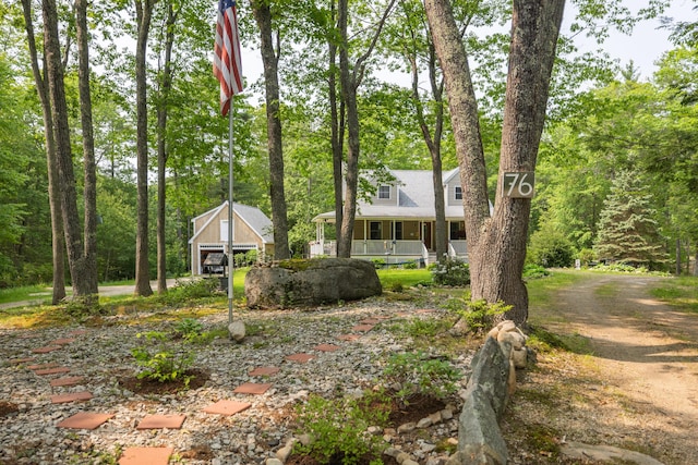 76 Punkintown Rd, Eliot, ME 03903 - view of front facade featuring an outdoor structure and a porch