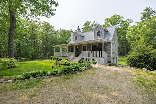 76 Punkintown Rd, Eliot, ME 03903 - view of front of house with covered porch, a chimney, a front yard, dirt driveway, and roof with shingles