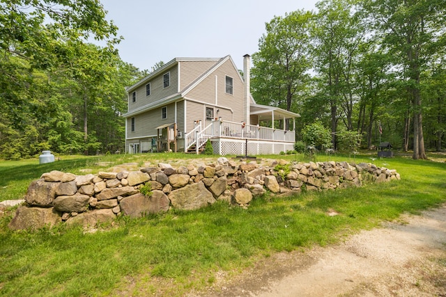 76 Punkintown Rd, Eliot, ME 03903 - view of side of property featuring a chimney and a wooden deck