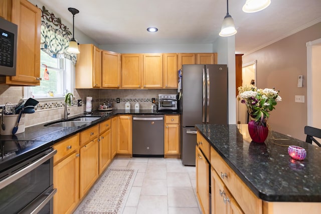76 Punkintown Rd, Eliot, ME 03903 - kitchen with appliances with stainless steel finishes, tasteful backsplash, hanging light fixtures, ornamental molding, and a kitchen island