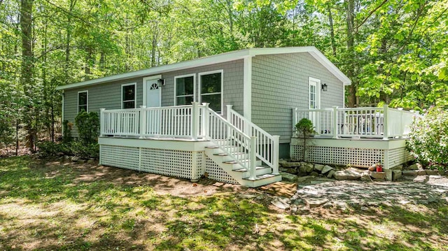 2 Mckenna Ln, York, ME 03909 - view of front of house with a wooden deck