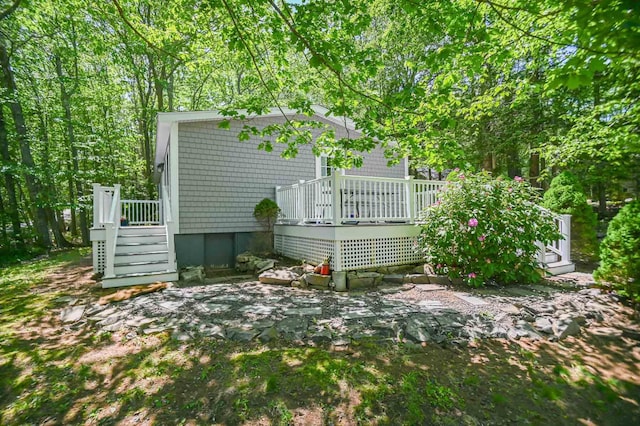 2 Mckenna Ln, York, ME 03909 - rear view of house featuring a deck and a patio