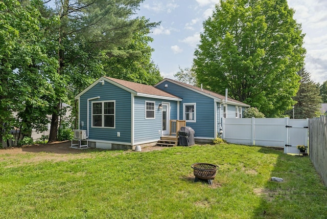 11 Meadow Ln, Portland, ME 04103 - back of property featuring a fire pit and a gate