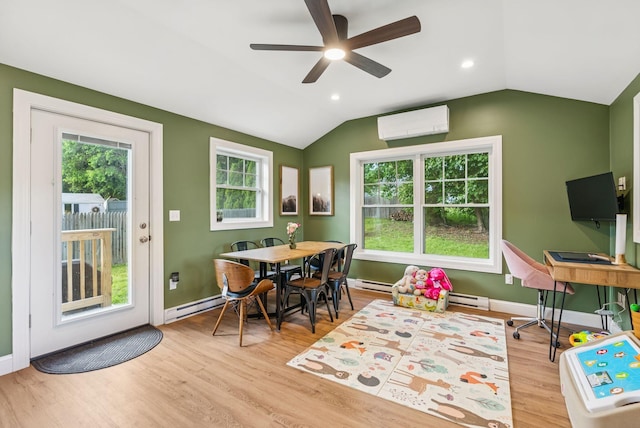 11 Meadow Ln, Portland, ME 04103 - dining room with a wall unit AC, baseboard heating, wood finished floors, healthy amount of natural light, and lofted ceiling
