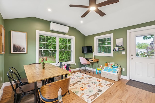 11 Meadow Ln, Portland, ME 04103 - dining area with an AC wall unit, vaulted ceiling, ceiling fan, plenty of natural light, and baseboards