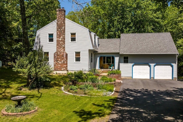 44 Pine Meadow Ct, North Berwick, ME 03906 - colonial inspired home with a chimney, a garage, driveway, and a front lawn