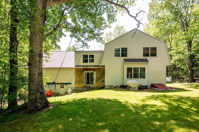 44 Pine Meadow Ct, North Berwick, ME 03906 - back of house featuring a gambrel roof, a lawn, and entry steps