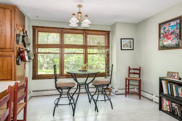 44 Pine Meadow Ct, North Berwick, ME 03906 - dining space featuring a chandelier