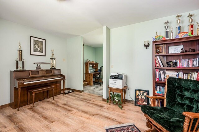 44 Pine Meadow Ct, North Berwick, ME 03906 - living area featuring wood finished floors, baseboards, and an office area