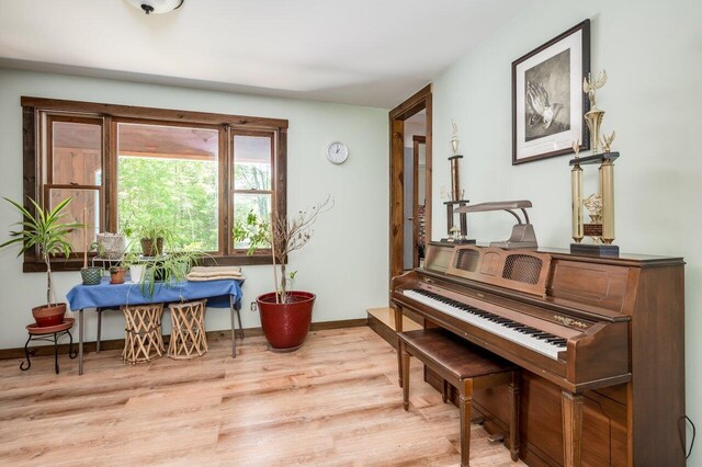 44 Pine Meadow Ct, North Berwick, ME 03906 - living area with wood finished floors and baseboards