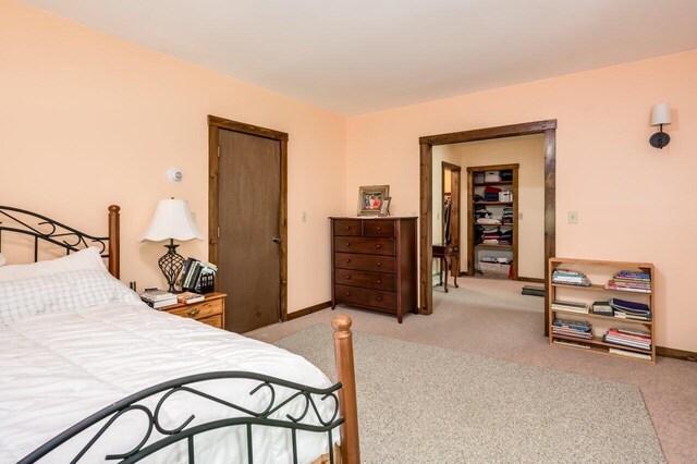 44 Pine Meadow Ct, North Berwick, ME 03906 - bedroom with light carpet, a closet, and baseboards