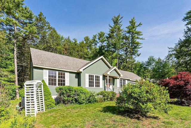 50 Village Green Drive Extension, Ogunquit, ME 03907 - view of front of property with a front lawn and roof with shingles
