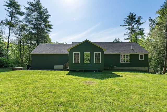 50 Village Green Drive Extension, Ogunquit, ME 03907 - back of house featuring a yard, a shingled roof, and cooling unit
