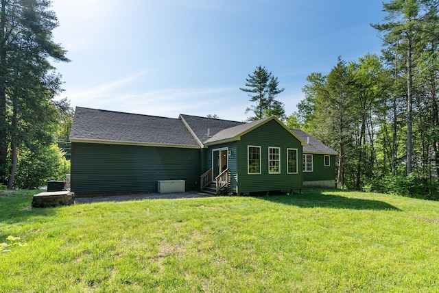 50 Village Green Drive Extension, Ogunquit, ME 03907 - rear view of property with entry steps, roof with shingles, and a lawn