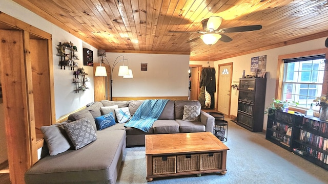 65 Pine Ridge Rd, Cushing, ME 04563 - living area with carpet flooring, a ceiling fan, wooden ceiling, and ornamental molding
