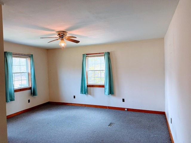 65 Pine Ridge Rd, Cushing, ME 04563 - carpeted spare room with healthy amount of natural light, a ceiling fan, and baseboards
