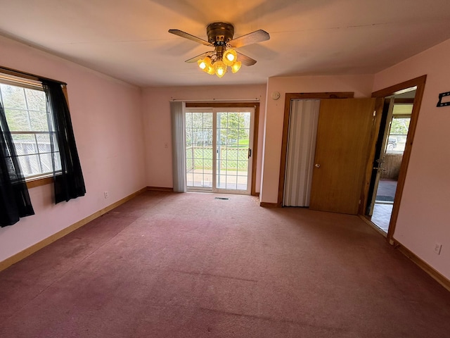 65 Pine Ridge Rd, Cushing, ME 04563 - empty room with ceiling fan, carpet, and baseboards