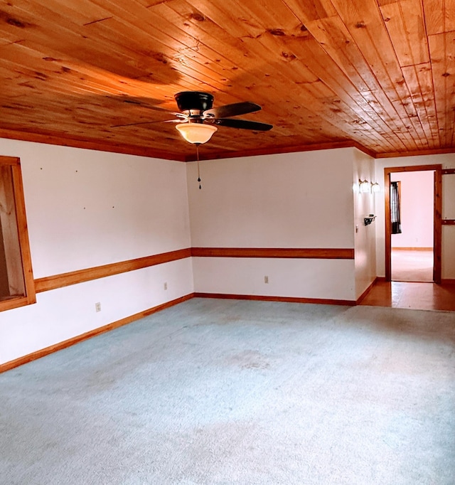 65 Pine Ridge Rd, Cushing, ME 04563 - empty room with wooden ceiling, a ceiling fan, carpet flooring, baseboards, and ornamental molding
