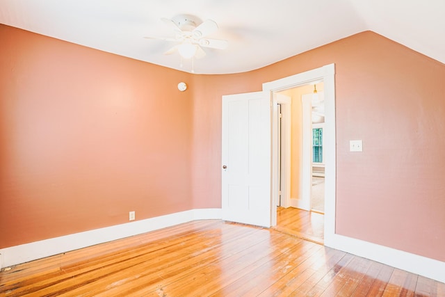 24 High St, Livermore Falls, ME 04254 - unfurnished bedroom featuring light wood-style flooring, a ceiling fan, and vaulted ceiling