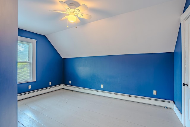 24 High St, Livermore Falls, ME 04254 - additional living space featuring vaulted ceiling, a ceiling fan, wood finished floors, and baseboard heating