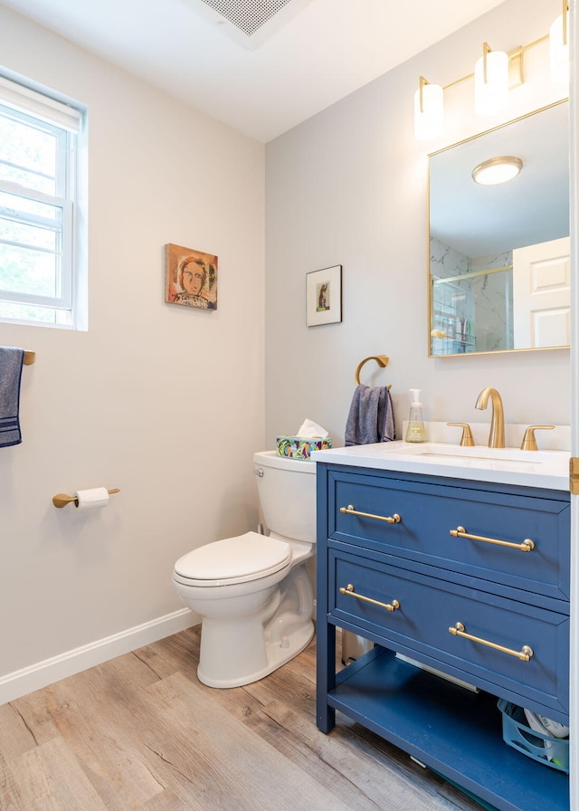 38 Guadalcanal St Unit 38, Brunswick, ME 04011 - full bath with wood finished floors, vanity, and a shower