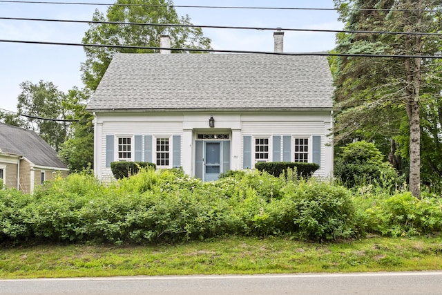 785 W Main St, Waldoboro, ME 04572 - cape cod home featuring a chimney and roof with shingles