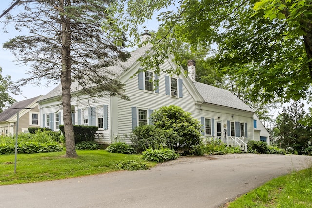 785 W Main St, Waldoboro, ME 04572 - view of front of house with a chimney and a front yard
