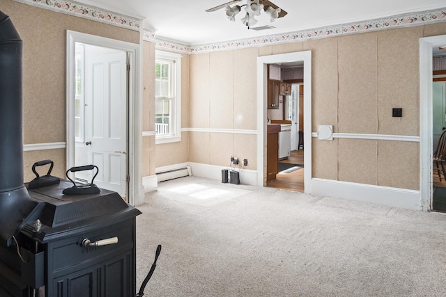 785 W Main St, Waldoboro, ME 04572 - unfurnished room with baseboard heating, a ceiling fan, and carpet floors