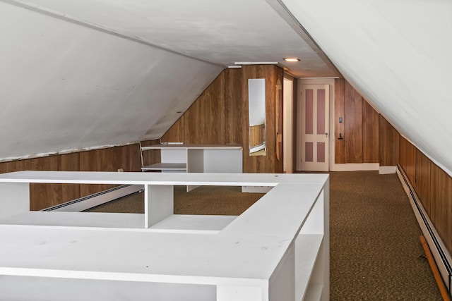 785 W Main St, Waldoboro, ME 04572 - bonus room featuring baseboard heating, wood walls, lofted ceiling, and dark carpet