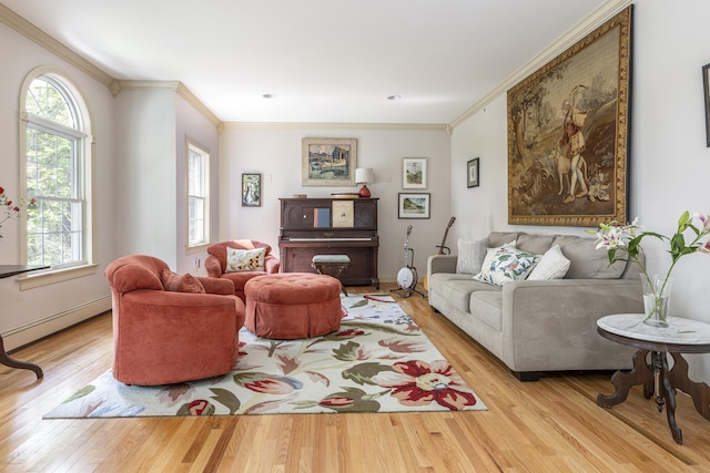 36 Acorn Ln, South Portland, ME 04106 - living area featuring crown molding, wood finished floors, baseboard heating, and healthy amount of natural light