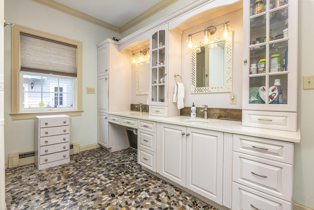 36 Acorn Ln, South Portland, ME 04106 - bathroom featuring double vanity, baseboard heating, and crown molding
