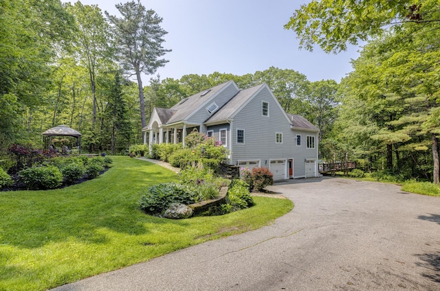 36 Acorn Ln, South Portland, ME 04106 - view of home's exterior featuring a garage, a gazebo, a lawn, and driveway