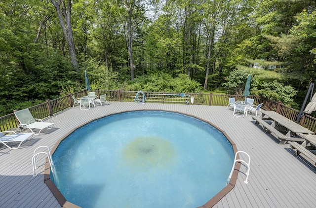36 Acorn Ln, South Portland, ME 04106 - view of swimming pool with outdoor dining area and a wooden deck