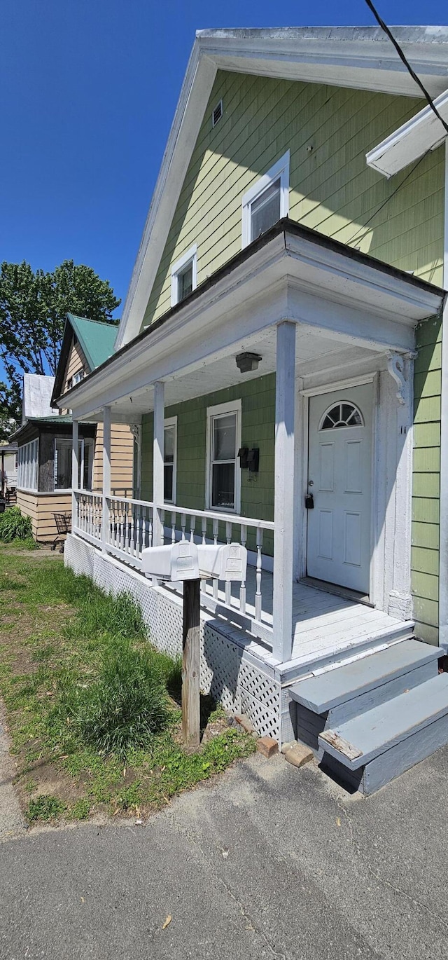 11 Gray St, Waterville, ME 04901 - view of front of property featuring a porch